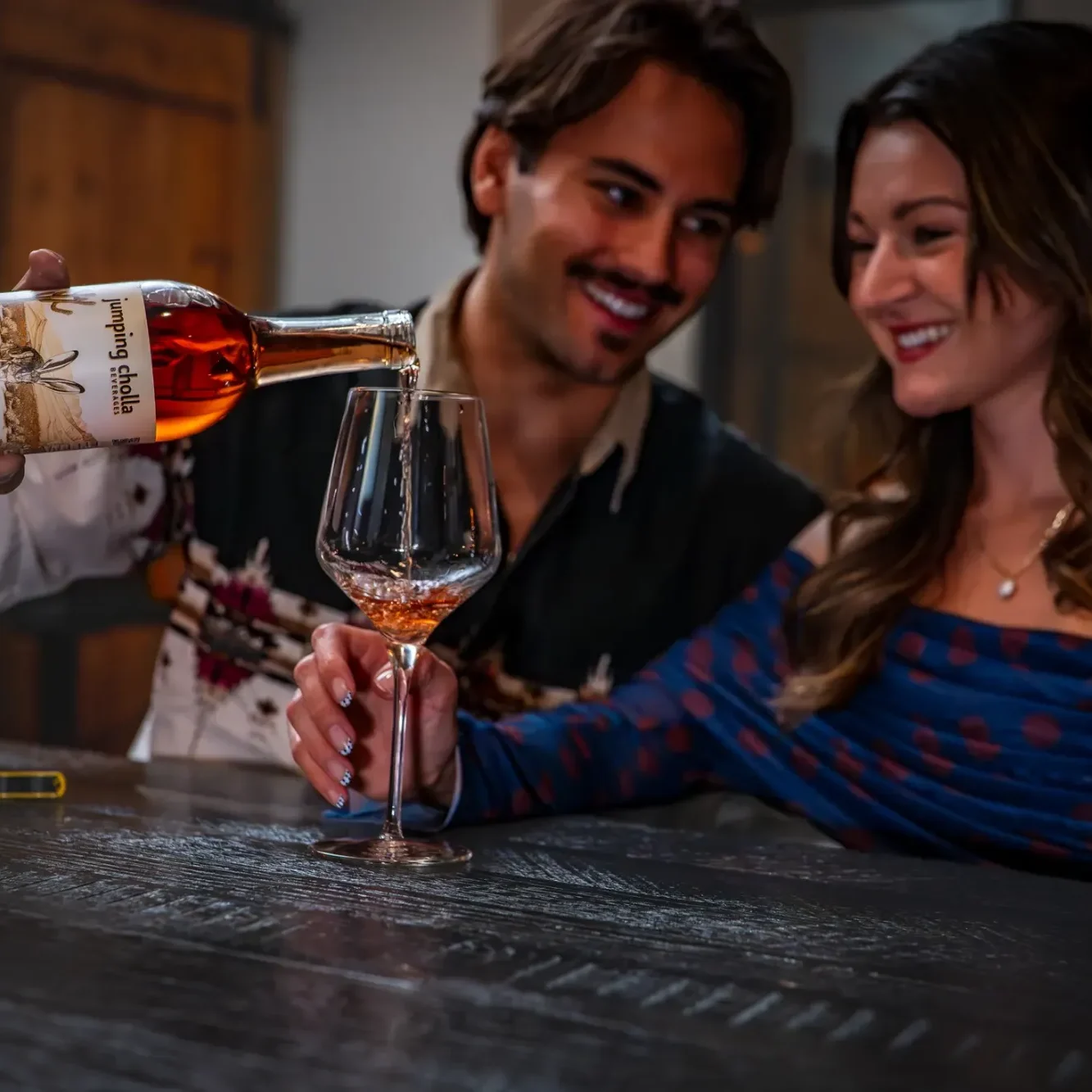 Image of a couple enjoying Jumping Cholla Beverages Arizona Rosé Wine