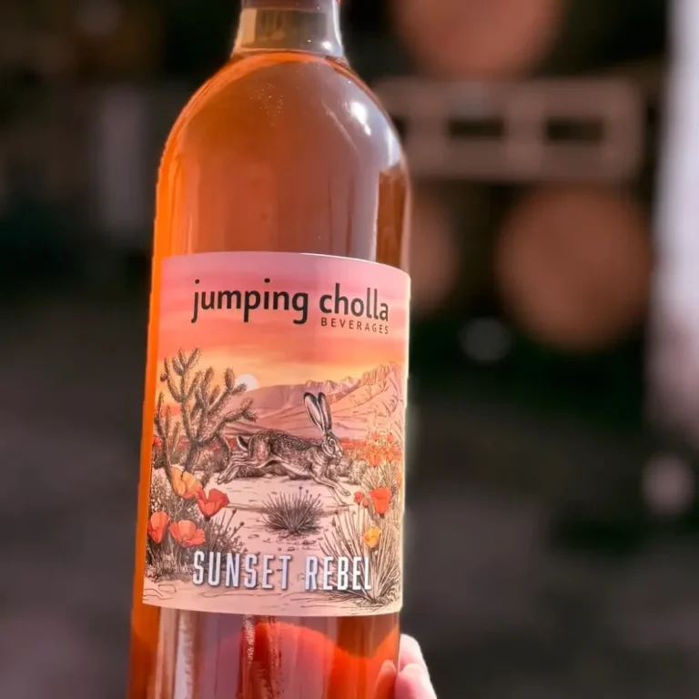 Jumping Cholla Beverages Arizona orange wine label of a cholla cactus, poppy flowers and a jack rabbit